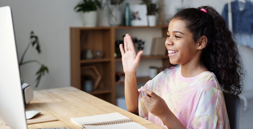 Young student on a computer tutoring lesson