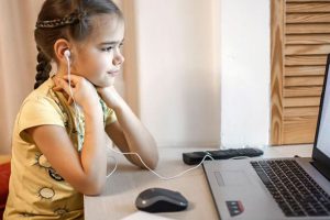 Young girl on a video tutoring call